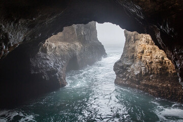 breathtaking ocean cave, where the tides carve intricate passageways through solid rock
