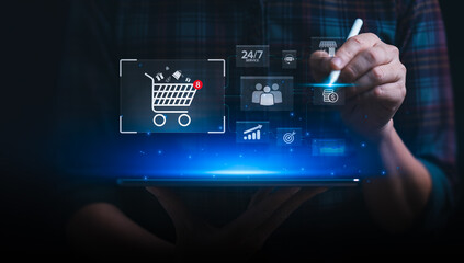 Business professional using digital tablet with online shopping cart, customer service icons, payment symbols, and growth indicators, representing ecommerce management, online sales strategy
