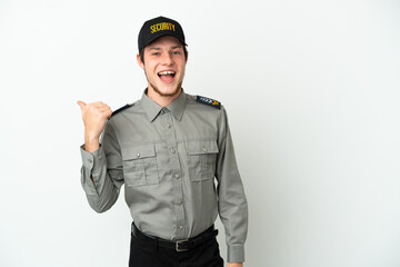 Fototapeta premium Young Russian security man isolated on white background pointing to the side to present a product
