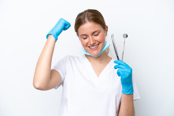 Dentist caucasian woman holding tools isolated on white background doing strong gesture