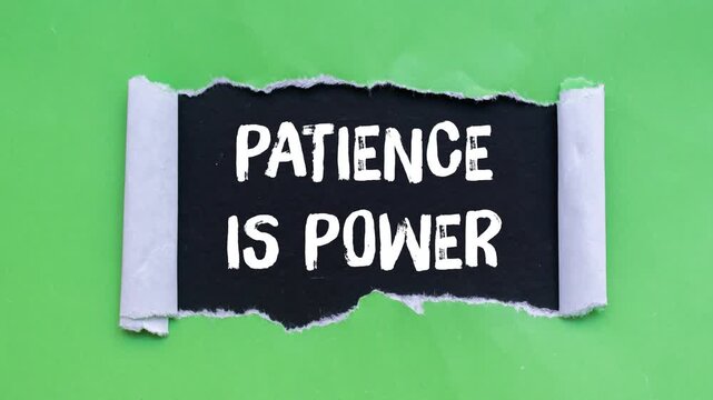 Patience is power message writing on ripped torn paper background
