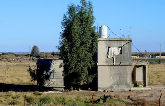 A rural house by the roadside in the lands surrounding the city of Azraq, eastern Jordan