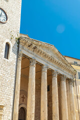 Naklejka premium Temple of Minerva and Torre del Popolo in Assisi