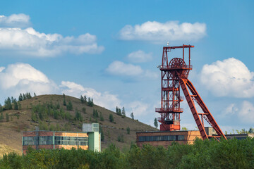 Zacler coal mine headframe under blue sky