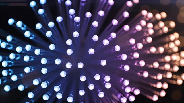 Abstract macro shot of a radiating bundle of optical fibers with dynamic color gradients