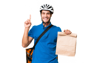 Young caucasian man taking a bag of takeaway food over isolated background showing and lifting a finger in sign of the best