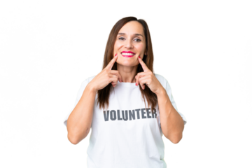 Middle age volunteer woman over isolated chroma key background smiling with a happy and pleasant expression