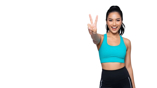 Radiant Asian Woman in Vibrant Sportswear Flashes a Cheerful Peace Sign, Exuding Confidence and Wellness Against a Clean White Backdrop, Symbolizing Health and Victory - Powered by Adobe