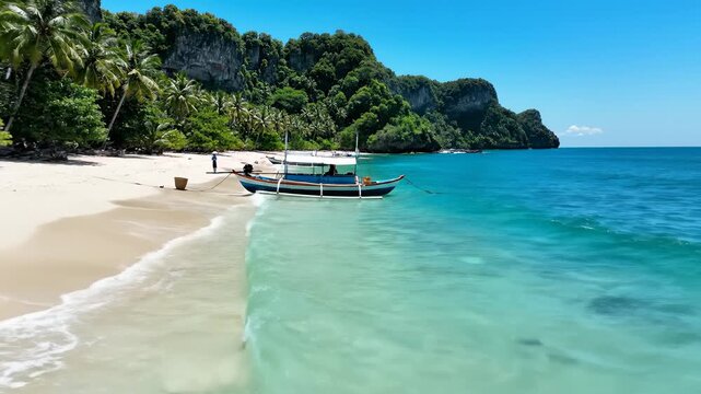 Fisherman Walking With Outrigger Canoe on Tropical Beach