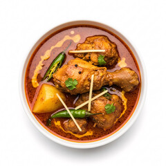 Delicious Chicken Curry with Potatoes and Chilies in a Bowl