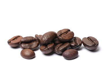 Heap of roasted coffee beans isolated on white background