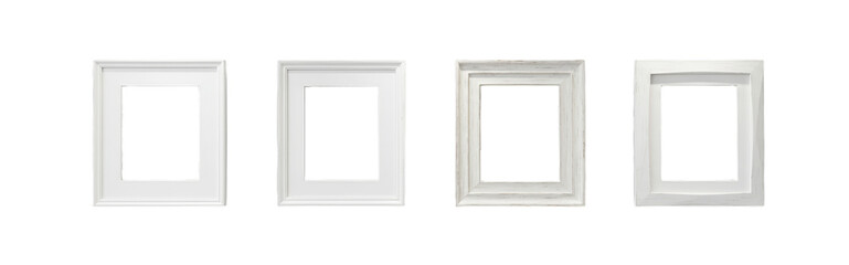 Four empty white vertical picture frames in various styles arranged in a row on a black background