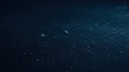 Fototapeta premium Minimal dark blue background with faint white dust texture, cold winter night mood