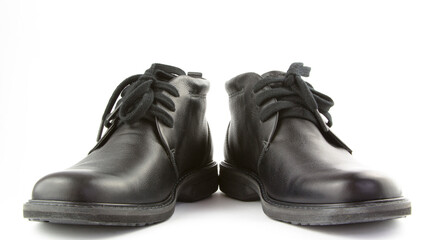 A pair of black leather shoes isolated on white