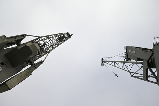 Industrial cranes at Hafencity Docks. Hamburg transport ald trading system.