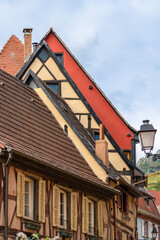 France, Alsace, village of Ribeauville, picturesque, colorful half-timbered house gabels in the historic center.