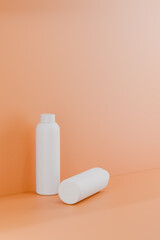 White reusable water bottles on pastel podium minimal mockup 3d rendering.
