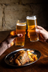 Two glasses of Kolsch beer cheers moment