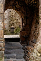 Obraz premium The Mont-Saint-Michel Abbey is an abbey located within the city and island of Mont-Saint-Michel in Normandy, in the department of Manche. The abbey is an essential part of the structural composition o
