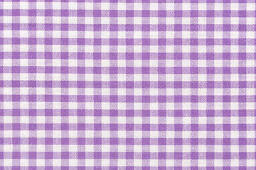 Purple cheched fabric background. High quality texture in extremely high resolution.