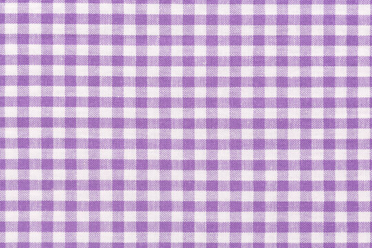 Purple cheched fabric background. High quality texture in extremely high resolution.