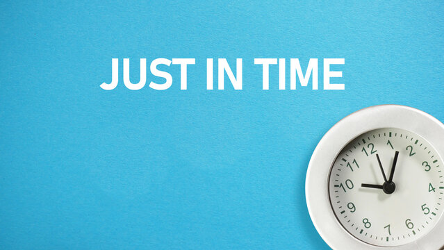 JIT just in time is shown using the text and photo of clock