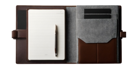 A high-angle shot of an open brown leather personal organizer with a notepad and pen isolated on white background