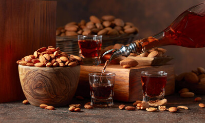 Italian liqueur Amaretto with almonds nuts.