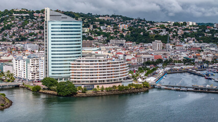 aerial view along area around Fort-de-France, with Malecon,  Cruise Ship Terminal, Old town and hilly landscape built-up in the background, situated in Martinique, Lesser Antilles, Caribbean Sea 