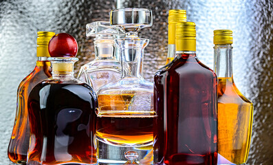 Bottles and carafes of assorted alcoholic beverages