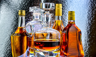 Bottles and carafes of assorted alcoholic beverages