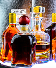 Bottles and carafes of assorted alcoholic beverages