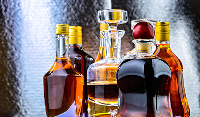 Bottles and carafes of assorted alcoholic beverages