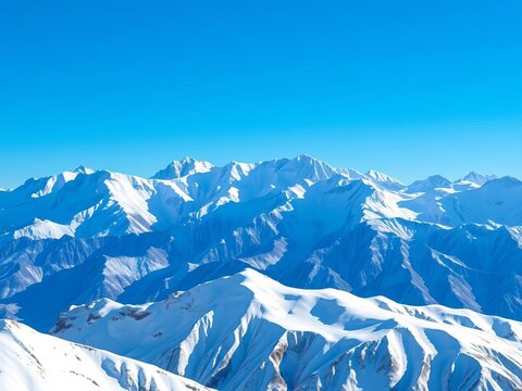 Snow-capped mountain range under a clear blue sky, majestic and serene,  serene,  alpine - Powered by Adobe