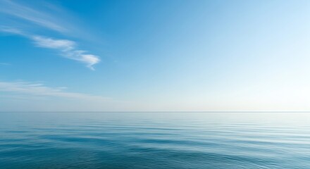 Obraz premium Serene Ocean Vista - Tranquility Under a Clear Blue Sky.