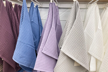Towels hang for sale at a home improvement store.