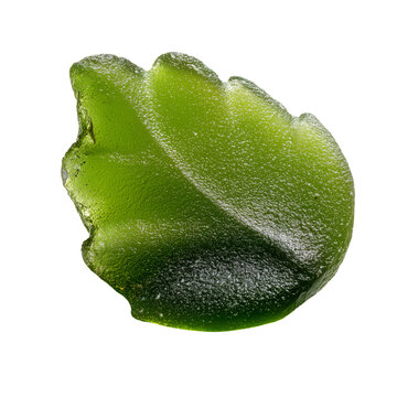 Green Glass Piece Shaped Like a Leaf Found on the Beach During Daytime