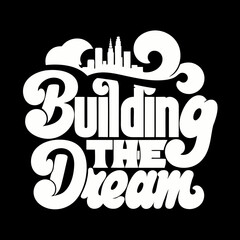 White text building the dream with city skyline silhouette