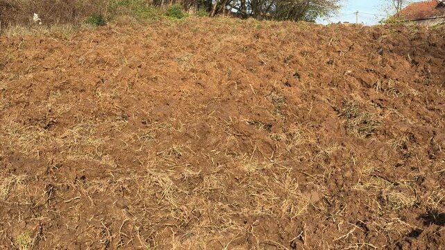 This is a freshly plowed field, being prepared for planting for a new business venture, and it will definitely require watering.