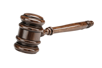 A close-up shot of a finely crafted wooden gavel against a solid black backdrop