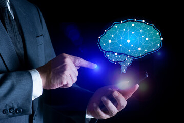 Businessman using smart phone with glowing digital brain innovation technology for data analysis, automation, and future innovation. AI Technology, thinking. Smart thinking concept