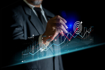 Set business goals and focused concept, Successful business growth, Targeting concept, Goals business, Business objective, Businessman point at target business icon for strategic planning to growth