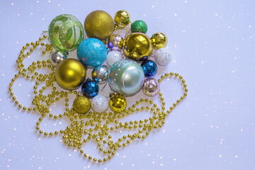 Christmas decorations. Different colorful Christmas balls of different sizes. Flat lay, copy space