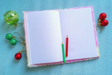 Open sketchbook with place for text or image. Christmas and New Year decorations