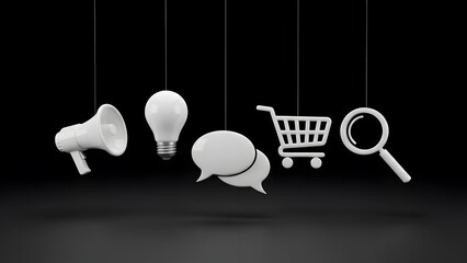 Business and marketing icons hanging by strings on a black background