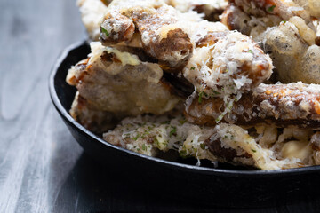 pan of cheesy italian potato skin crisps