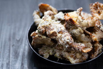 pan of cheesy italian potato skin crisps