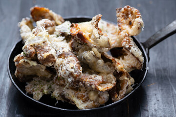 pan of cheesy italian potato skin crisps