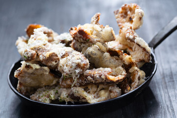 pan of cheesy italian potato skin crisps