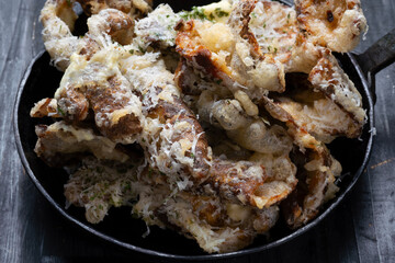 pan of cheesy italian potato skin crisps